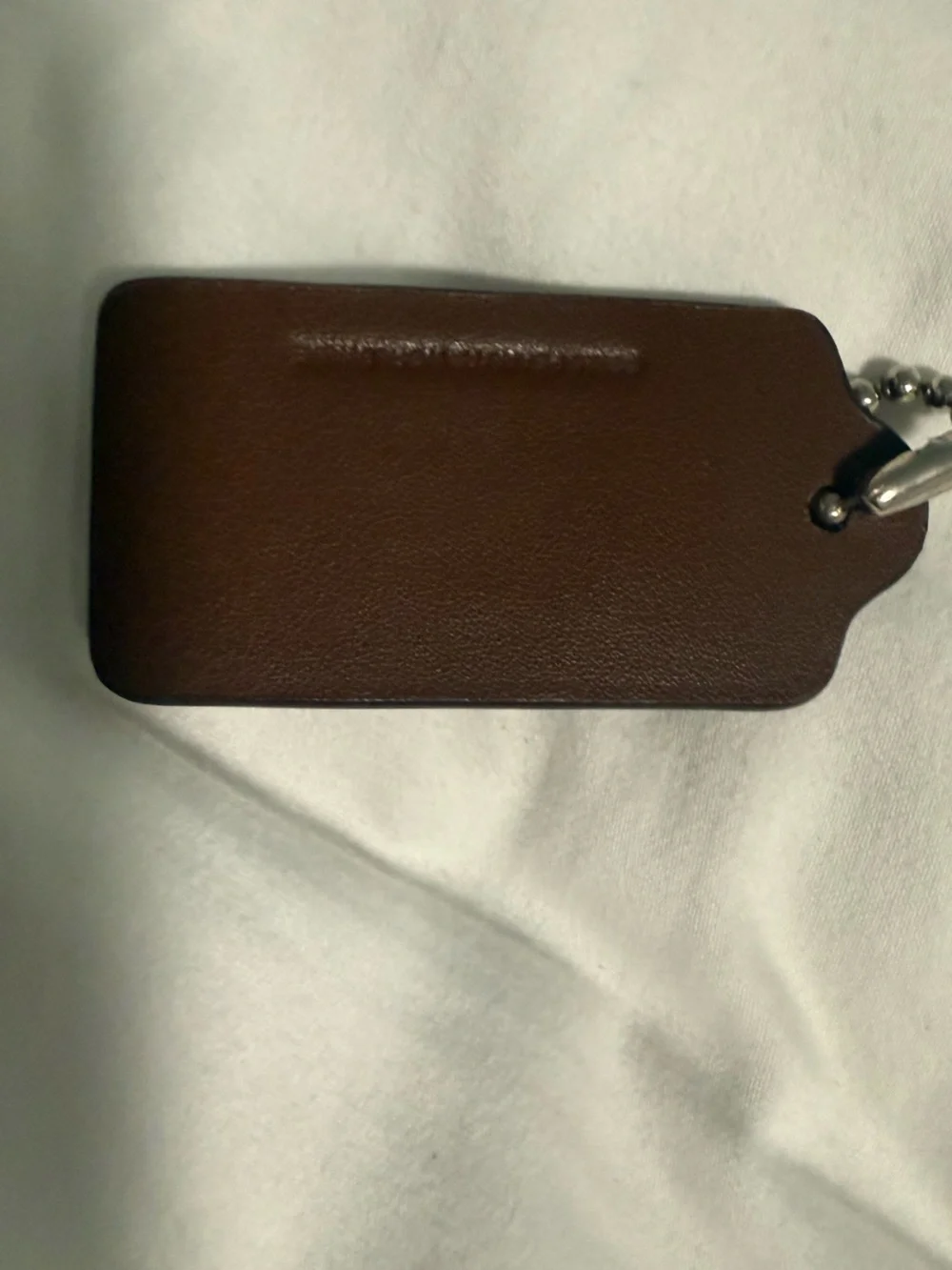 Coach and Peanuts Collab brown Hangtag!